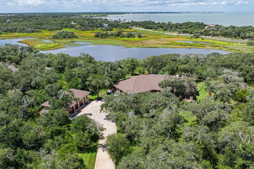 Nestled amidst 10.5 acres, this craftsman home seamlessly blends - Beach Home for sale in Rockport, Texas on Beachhouse.com