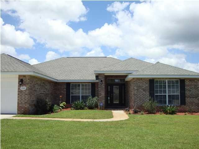 Beautiful Upgraded 4-5 BDR 2 BTH Brick Home on .33 Acre Corner - Beach Home for sale in Navarre, Florida on Beachhouse.com
