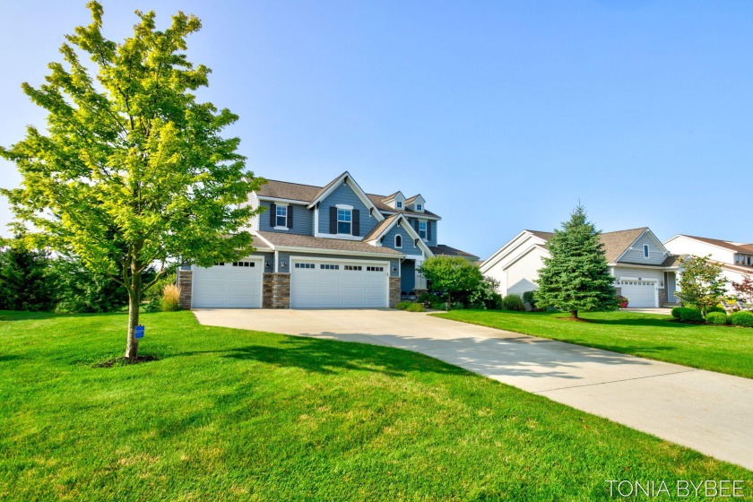 Location, location, location!  This wonderful home is located in - Beach Home for sale in Holland, Michigan on Beachhouse.com