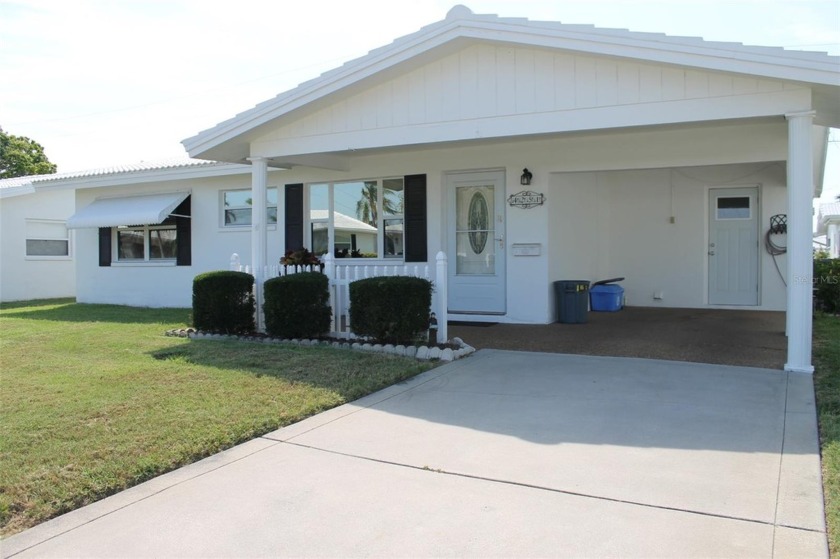 This single-family home located in Unit 2 of Mainlands by the - Beach Home for sale in Pinellas Park, Florida on Beachhouse.com