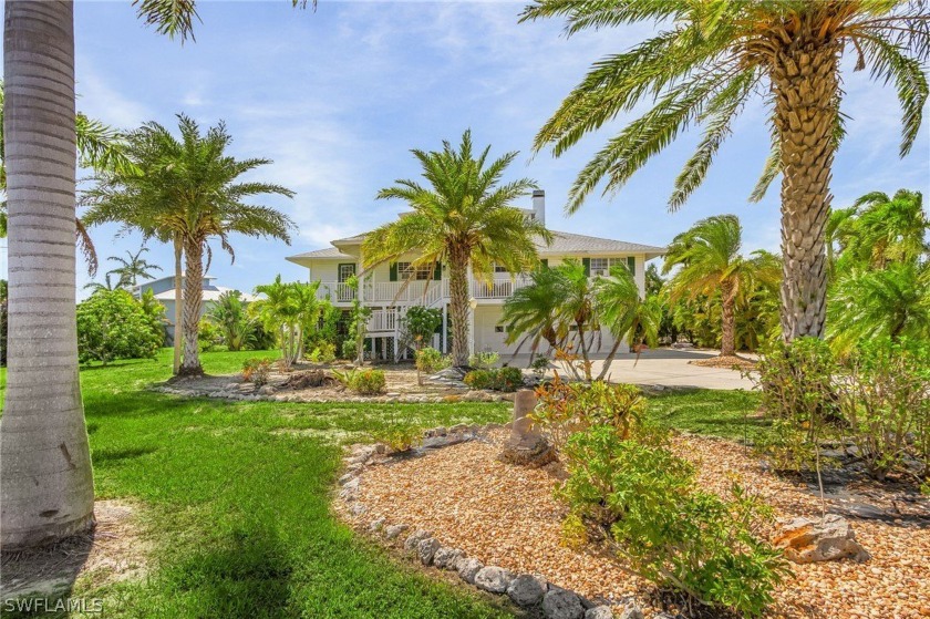 Key West style home on 1/2-acre waterfront lot offers a tranquil - Beach Home for sale in ST. James City, Florida on Beachhouse.com