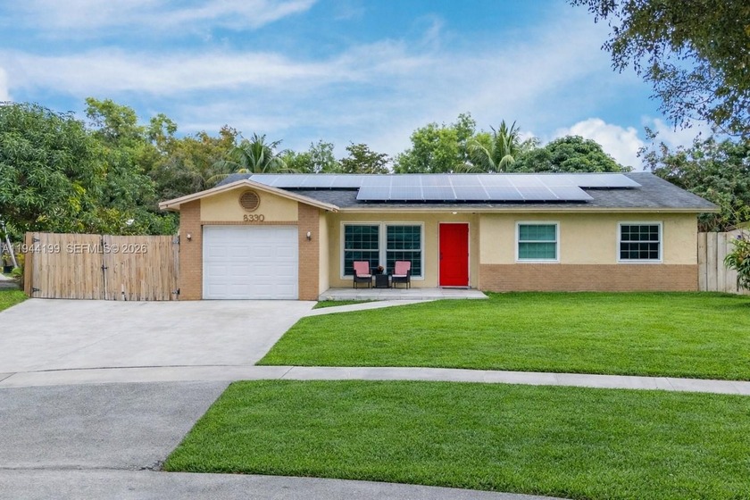 This beautifully upgraded home sits on an oversized lot and - Beach Home for sale in Pembroke Pines, Florida on Beachhouse.com