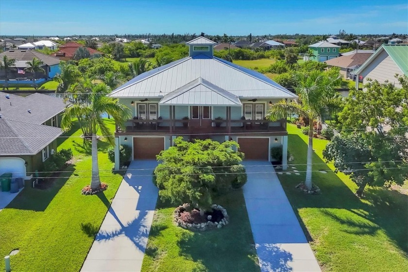 Sailboat Waterfront Retreat with Pool, Dock, Lift & Key West - Beach Home for sale in Port Charlotte, Florida on Beachhouse.com