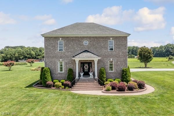 STUNNING ALL BRICK HOME ON LOVELY 3+ ACRE LOT. AS YOU ENTER HOME - Beach Home for sale in Chesapeake, Virginia on Beachhouse.com