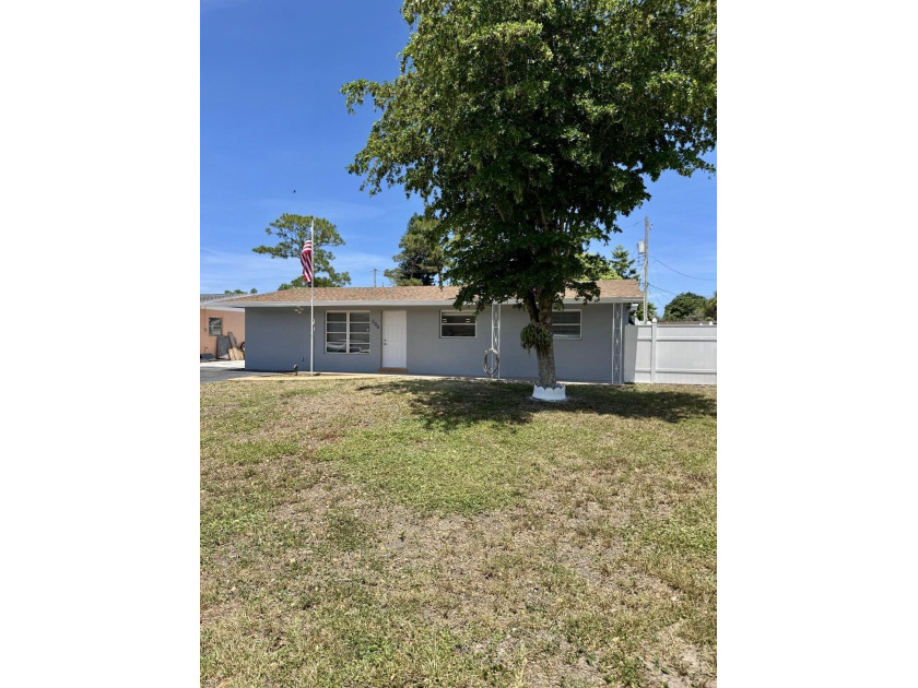 Don't miss this updated 4-bed, 2-bath home in a sought-after - Beach Home for sale in West Palm Beach, Florida on Beachhouse.com