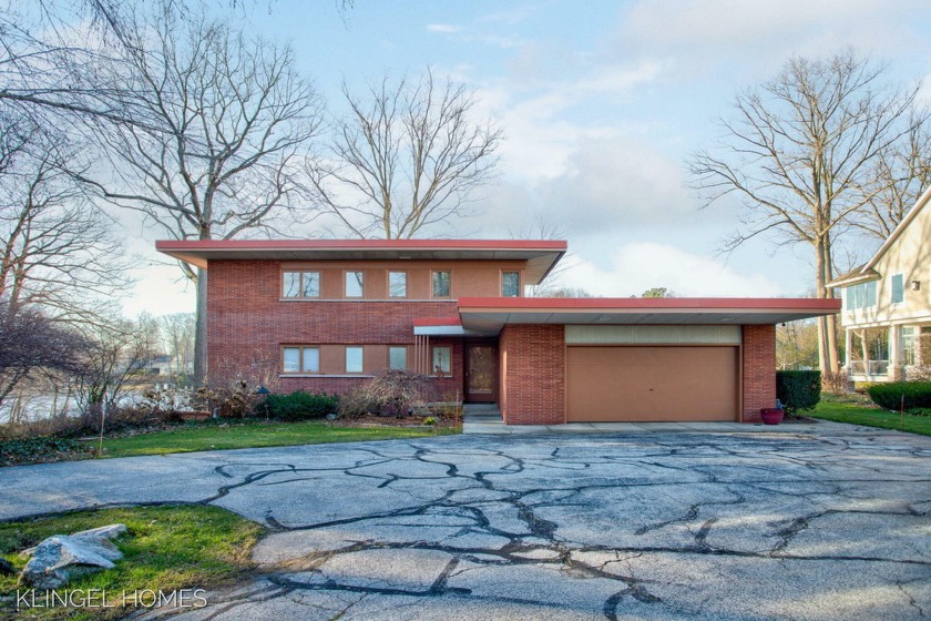 Welcome to 16160 Highland Dr, Spring Lake! This stunning - Beach Home for sale in Spring Lake, Michigan on Beachhouse.com