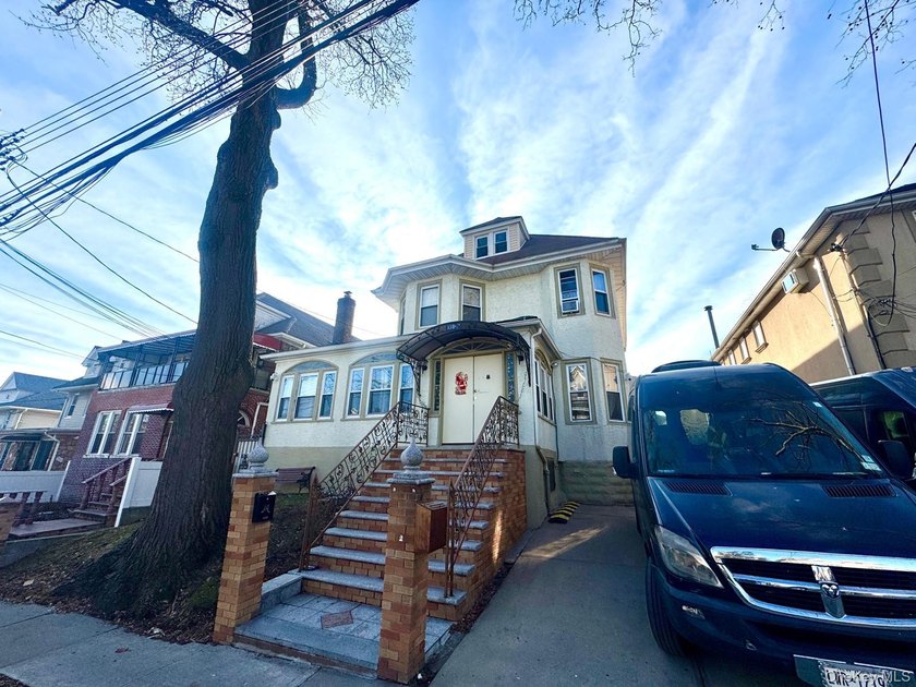 Welcome to a truly charming two-family residence in the heart of - Beach Home for sale in East Elmhurst, New York on Beachhouse.com