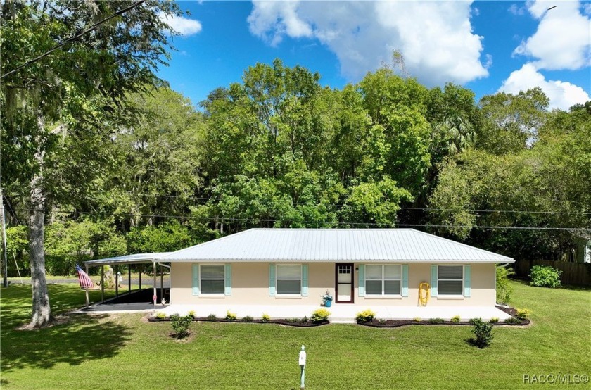 Welcome to this meticulously updated concrete block home - Beach Home for sale in Inglis, Florida on Beachhouse.com