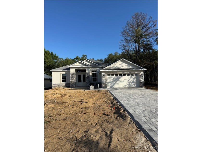 This meticulously crafted 2025 Genesis 2 model home boasts 3 - Beach Home for sale in Homosassa, Florida on Beachhouse.com