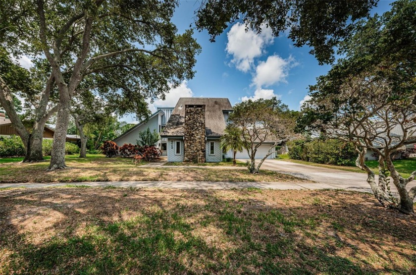 Welcome to this 4-bedroom and 3.5-bathroom Pool Home situated on - Beach Home for sale in Seminole, Florida on Beachhouse.com