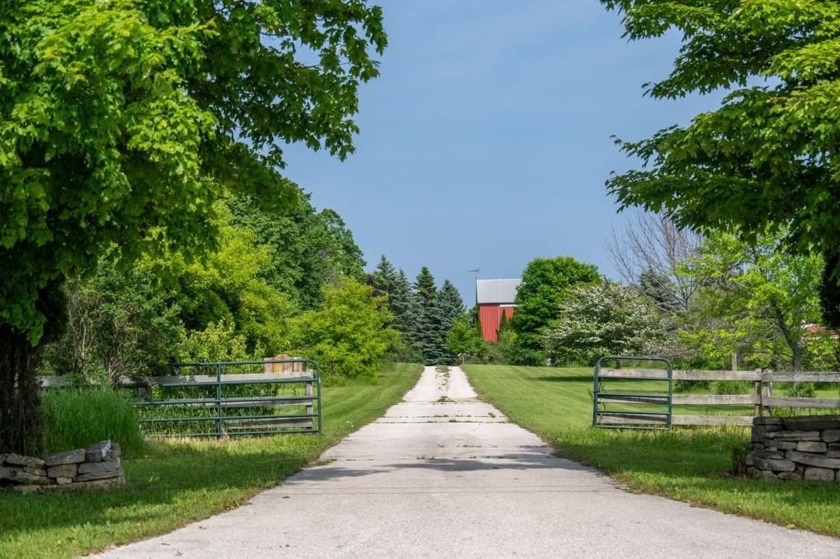Location! Location! And SO picturesque! This 20-acre parcel - Beach Home for sale in Egg Harbor, Wisconsin on Beachhouse.com
