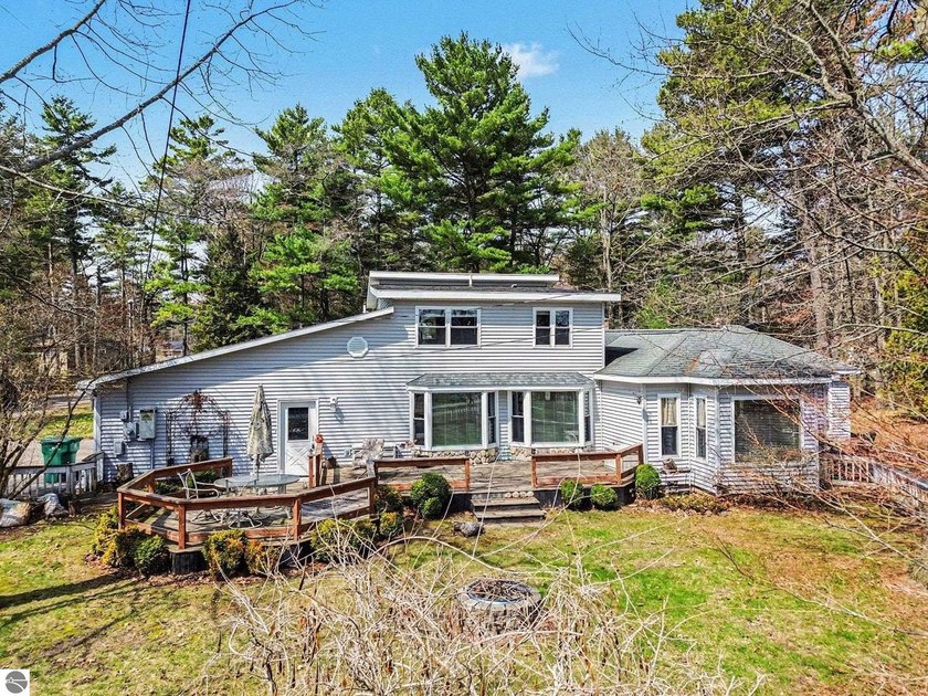 Located on highly desirable Huron Hills Drive, this unique - Beach Home for sale in East Tawas, Michigan on Beachhouse.com