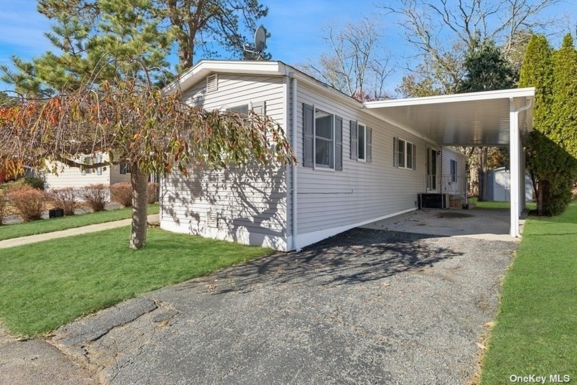 Located in the Riverwoods mobile home community. Must be 55 - Beach Home for sale in Riverhead, New York on Beachhouse.com