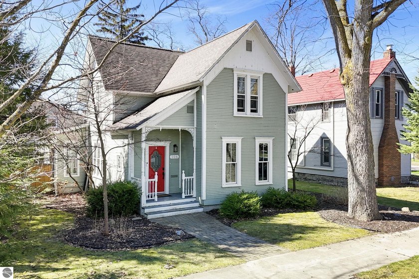 Welcome to an exceptional downtown residence where location - Beach Home for sale in Traverse City, Michigan on Beachhouse.com