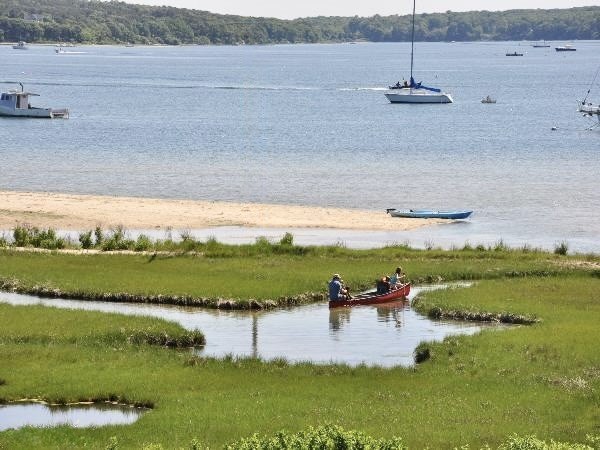 Set along the shimmering edge of The Lagoon and Brush Pond, this - Beach Home for sale in Oak Bluffs, Massachusetts on Beachhouse.com
