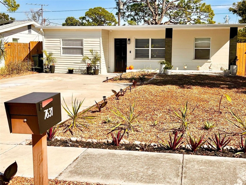 Welcome to 7631 46th Way N -- a move-in-ready home that combines - Beach Home for sale in Pinellas Park, Florida on Beachhouse.com