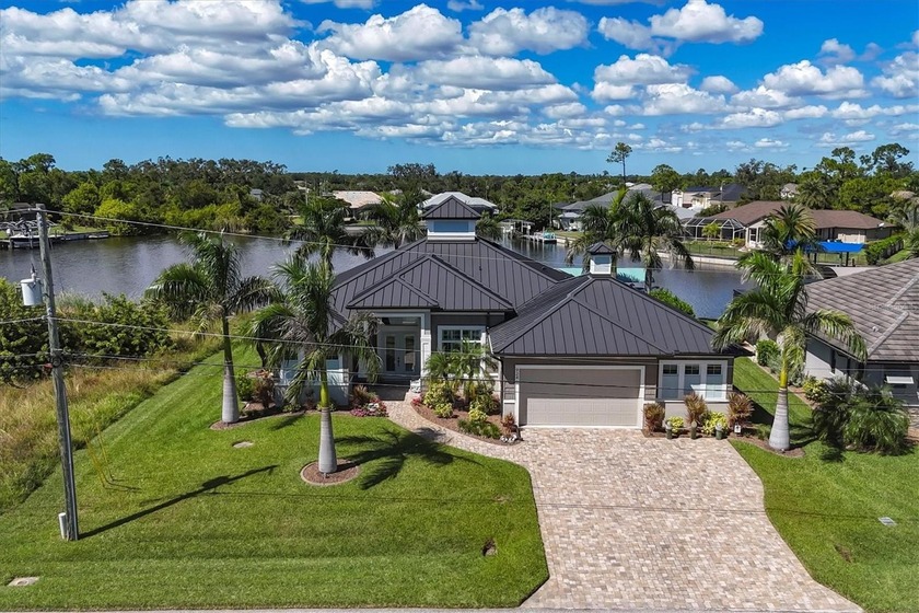Exceptional 2017 coastal style waterfront home in the highly - Beach Home for sale in Port Charlotte, Florida on Beachhouse.com