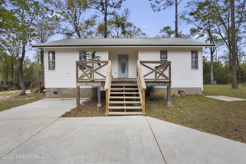 Welcome to your waterfront retreat! This beautifully remodeled - Beach Home for sale in Moss Point, Mississippi on Beachhouse.com