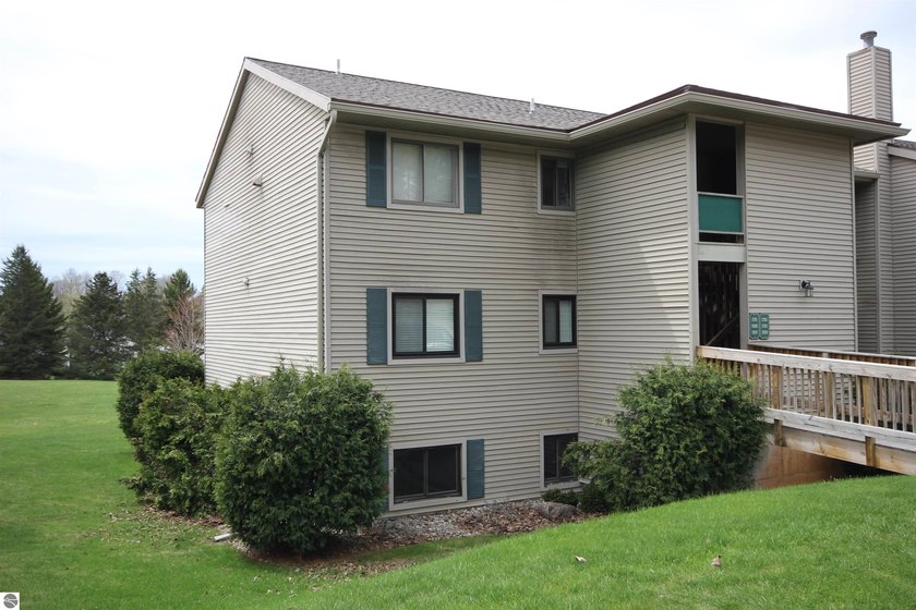 Enjoy living with Green views of the pristine Crown Golf Course - Beach Condo for sale in Traverse City, Michigan on Beachhouse.com