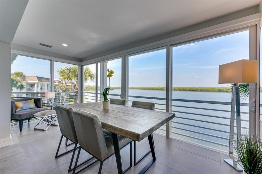 Modern waterfront living at its finest! This stunning Bayview - Beach Condo for sale in Longboat Key, Florida on Beachhouse.com
