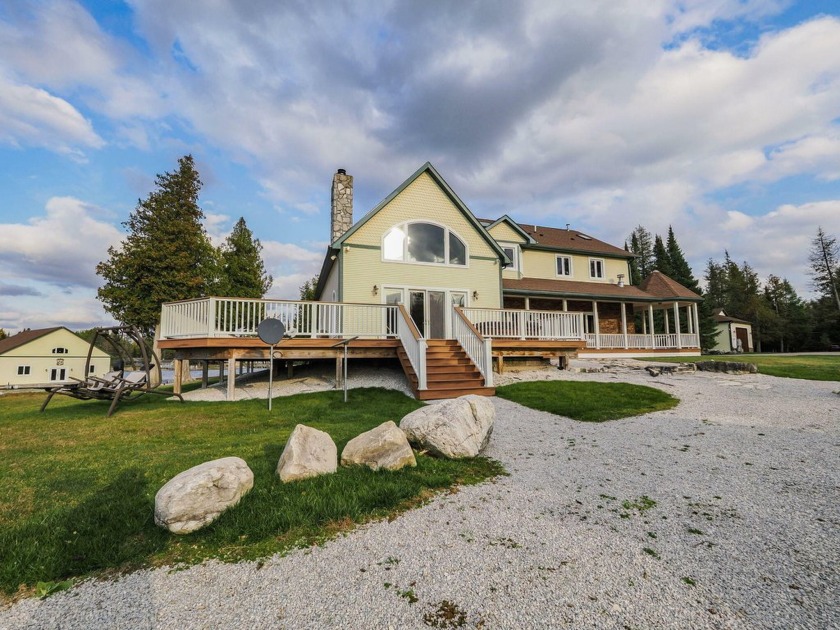 ''Sunset Point'' is luxury lakefront living at its finest. This - Beach Home for sale in Cedarville, Michigan on Beachhouse.com