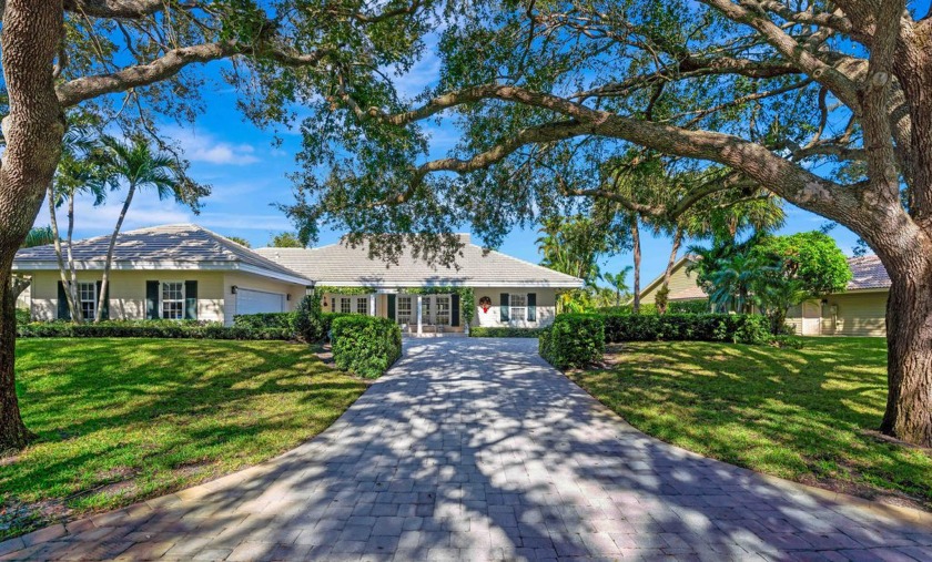 Located in the prestigious gated community of Heritage Oaks - Beach Home for sale in Jupiter, Florida on Beachhouse.com