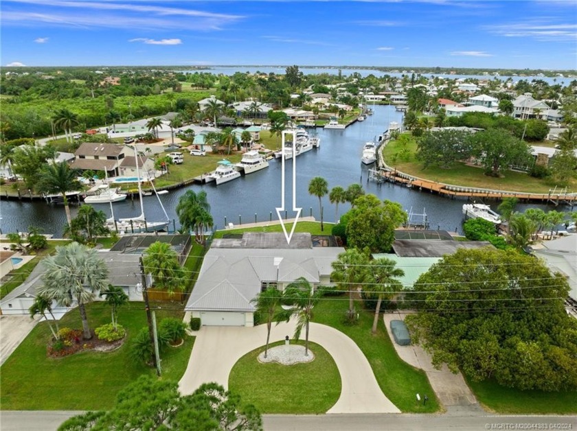Welcome to this impeccably maintained home in Palm City. Nestled - Beach Home for sale in Palm City, Florida on Beachhouse.com
