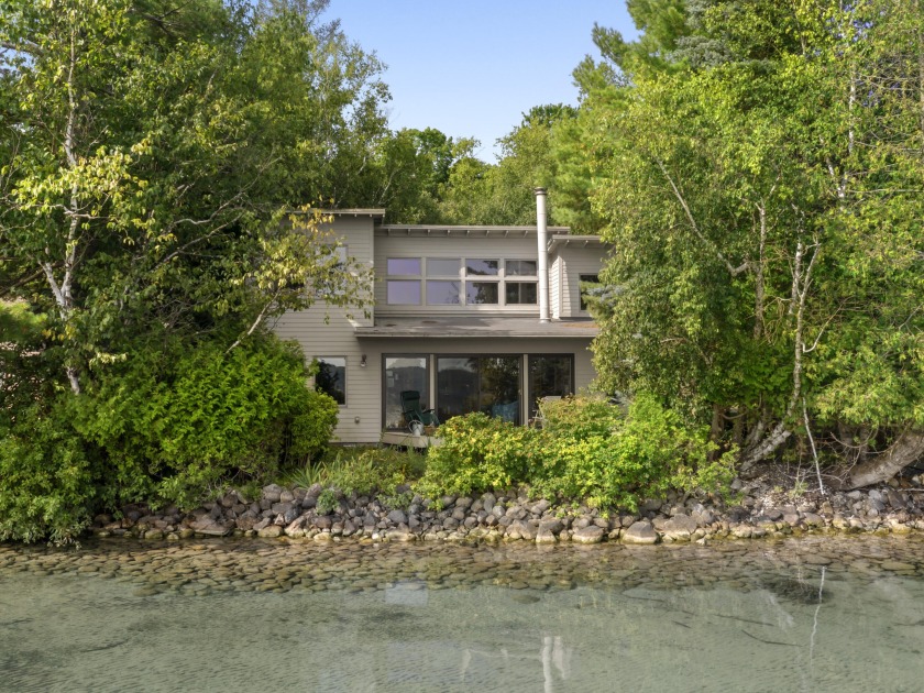 Welcome to Your Mid-Century Modern Lakefront Dream Home. Nestled - Beach Home for sale in Frankfort, Michigan on Beachhouse.com