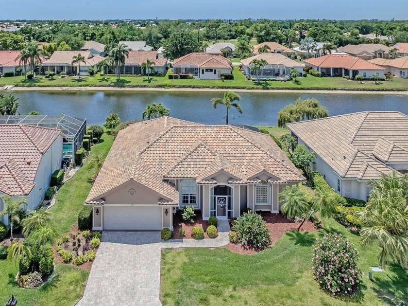 Nestled within Premier Pelican Pointe Golf & Country Club, this - Beach Home for sale in Venice, Florida on Beachhouse.com