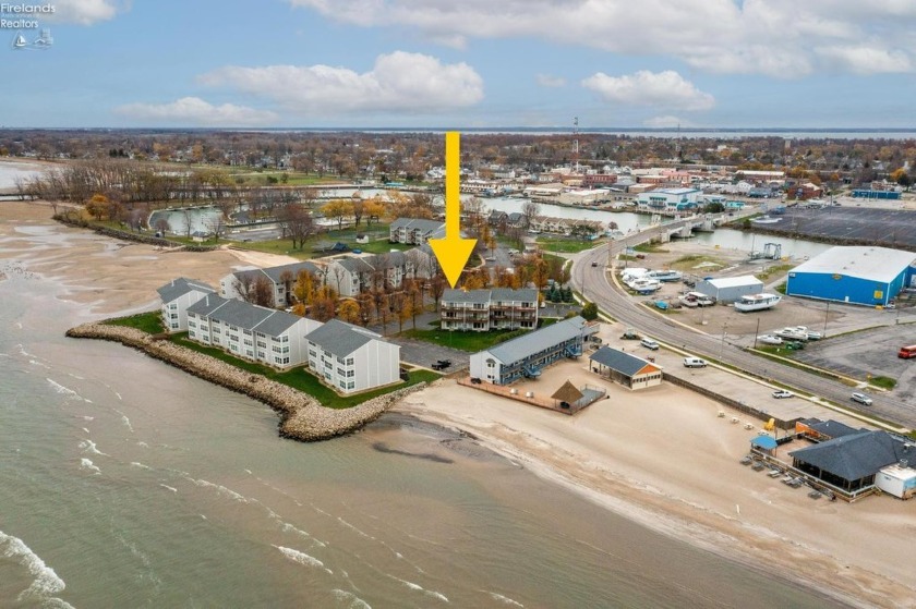 Enjoy waterfront living at its finest with this stunning Lake - Beach Condo for sale in Port Clinton, Ohio on Beachhouse.com