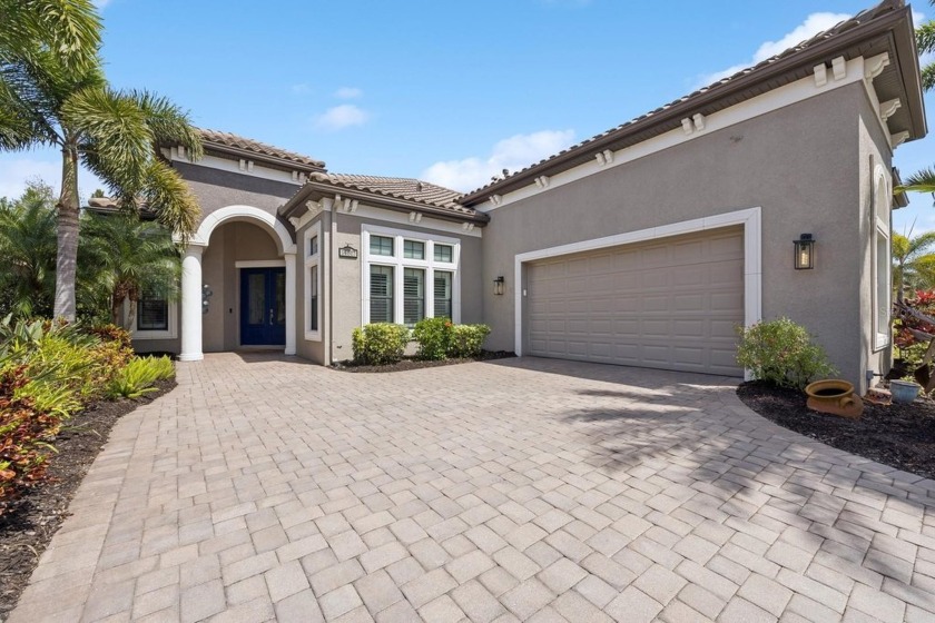 This beautifully designed 3-bedroom, 3.5-bath home with a - Beach Home for sale in Lakewood Ranch, Florida on Beachhouse.com