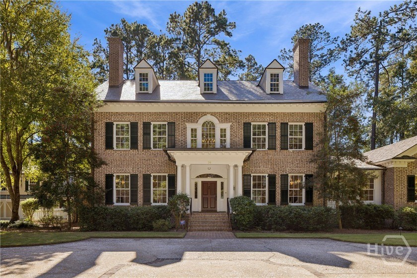 Set on a 2.85-acre estate overlooking the quiet shimmer of Lake - Beach Home for sale in Richmond Hill, Georgia on Beachhouse.com