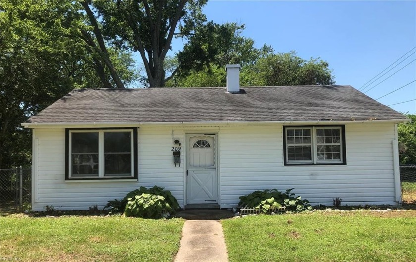 This freshly painted home with newer carpet and a large backyard - Beach Home for sale in Hampton, Virginia on Beachhouse.com