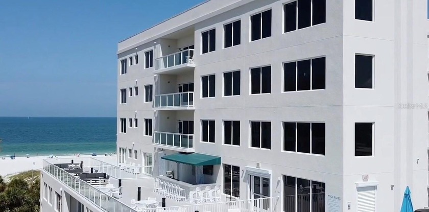 Welcome to 24 Avalon St #305, a stunning ADA-compliant condo in - Beach Condo for sale in Clearwater Beach, Florida on Beachhouse.com