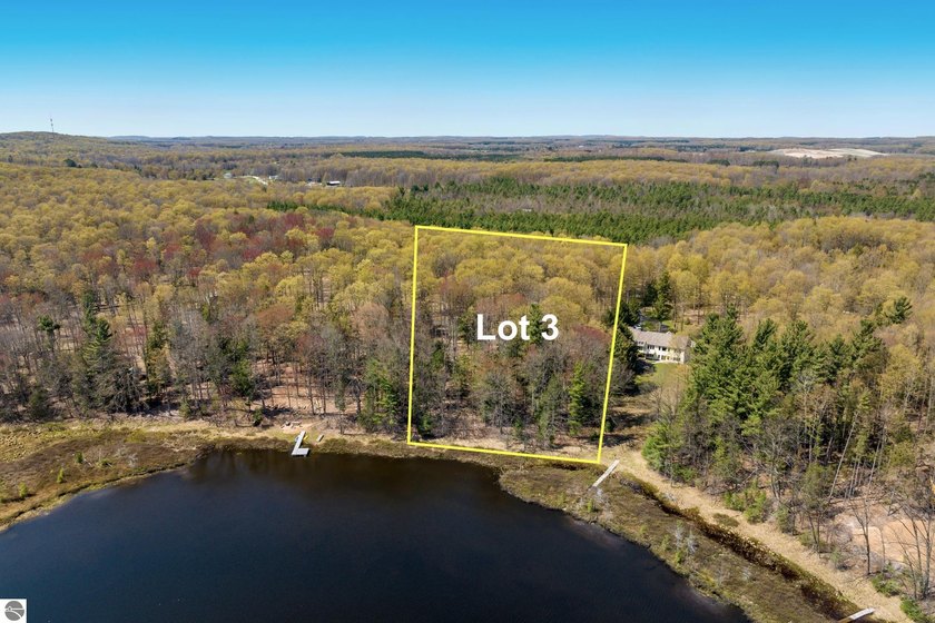 A rare treasure! Enjoy tranquil views of private PIKES LAKE near - Beach Acreage for sale in Traverse City, Michigan on Beachhouse.com