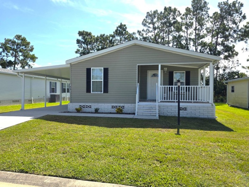 THIS HOME IS ON LEASED LAND WITH A MONTHLY LOT RENT OF $442 AND - Beach Home for sale in Homosassa, Florida on Beachhouse.com