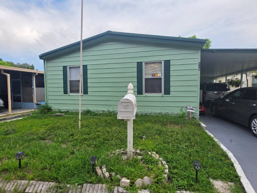 226 Palm Dr, Tampa FL 33613 - 55+ Rose Lake Estates    1,344 sq - Beach Home for sale in Tampa, Florida on Beachhouse.com