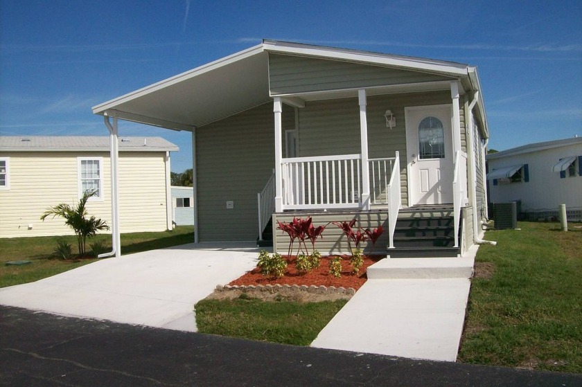 This is a beautiful '2023 Jacobsen double wide home that is - Beach Home for sale in Venice, Florida on Beachhouse.com