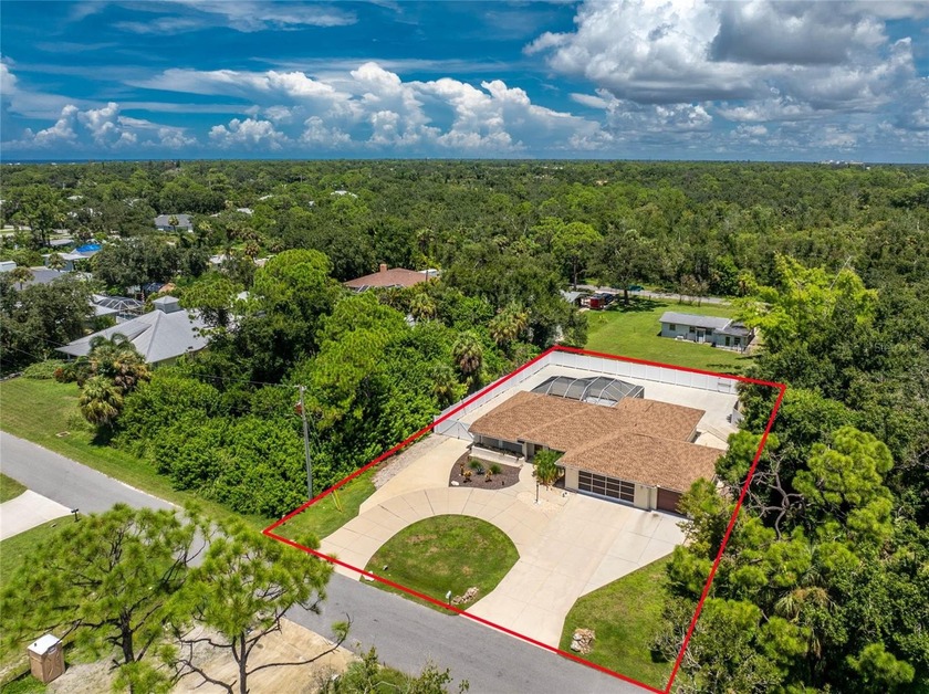 A coastal retreat less than a mile from Manasota Key Beach and - Beach Home for sale in Englewood, Florida on Beachhouse.com