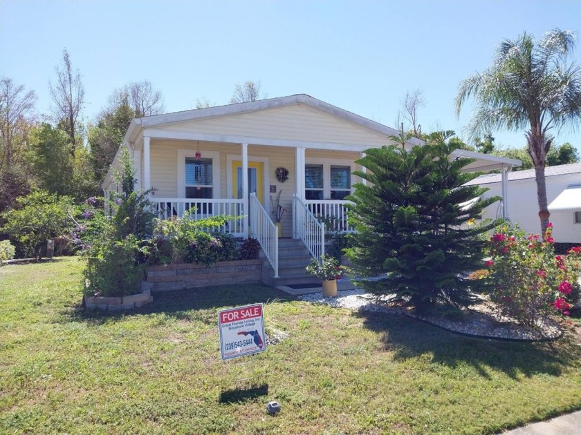This Palm Harbor Home features an open concept living room.  You - Beach Home for sale in North Fort Myers, Florida on Beachhouse.com