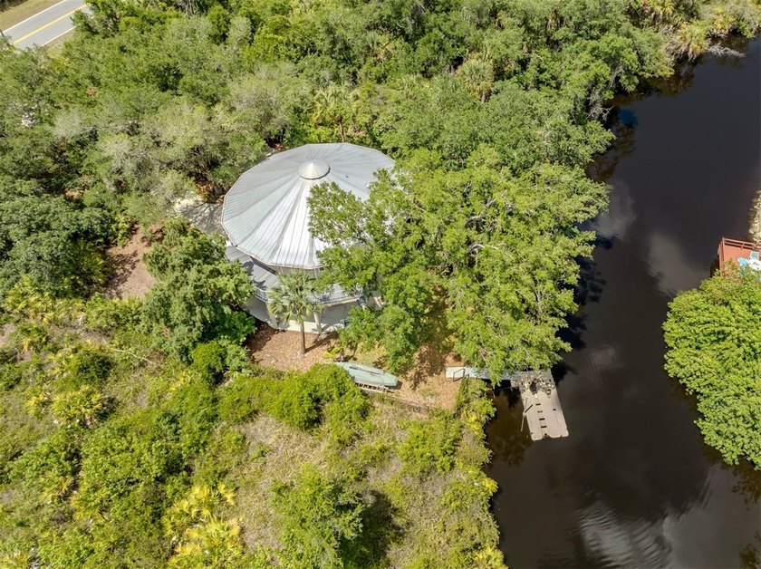 Tucked high among the trees and overlooking the Myakka River - Beach Home for sale in North Port, Florida on Beachhouse.com