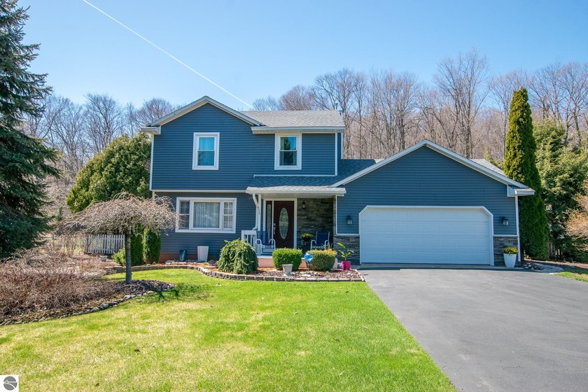 Perfectly positioned along scenic M-22 at the midway point - Beach Home for sale in Traverse City, Michigan on Beachhouse.com
