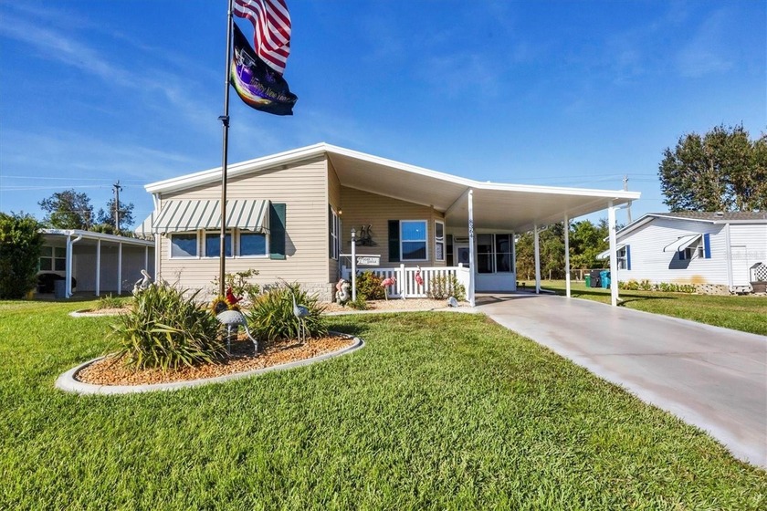 Welcome to the highly sought-after Lemon Bay Isles, a serene and - Beach Home for sale in Englewood, Florida on Beachhouse.com