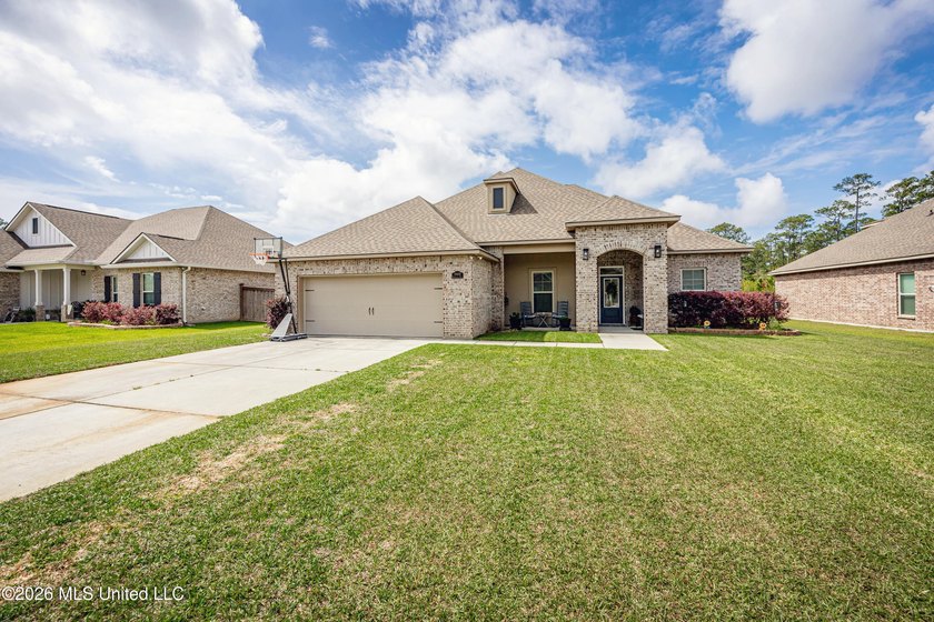 Spacious and inviting, this large brick home offers the perfect - Beach Home for sale in Ocean Springs, Mississippi on Beachhouse.com