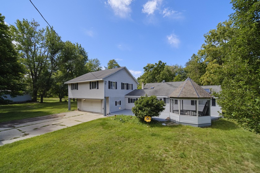 Endless possibilities await with this 7-bedroom, 3 Bathroom - Beach Home for sale in Manistee, Michigan on Beachhouse.com