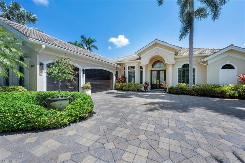 This timeless and elegant residence in Kensington Gardens with a - Beach Home for sale in Naples, Florida on Beachhouse.com