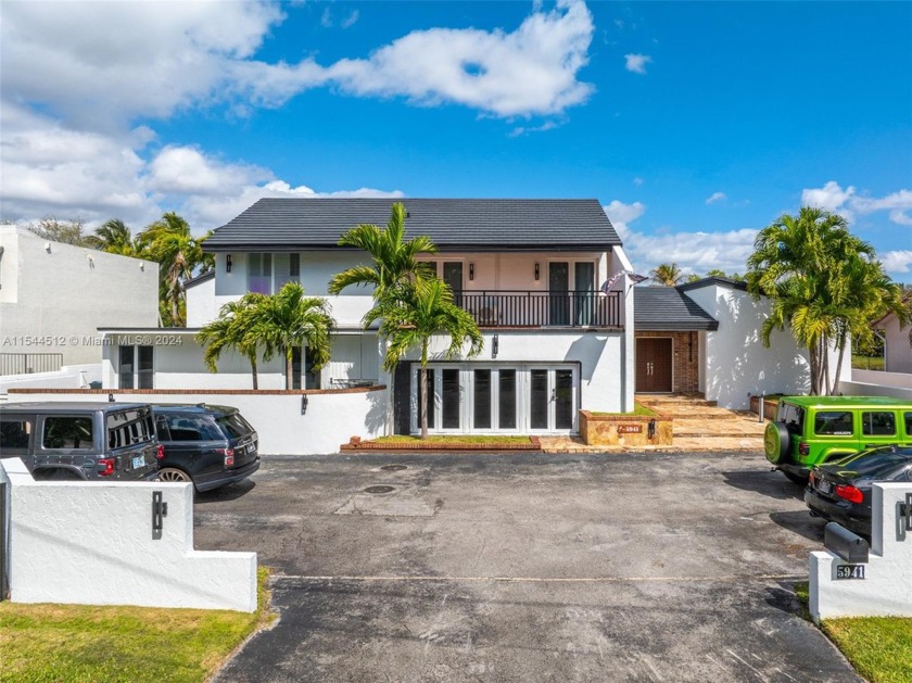 Nestled on the border of South Miami & Pinecrest, this 2-story - Beach Home for sale in South Miami, Florida on Beachhouse.com