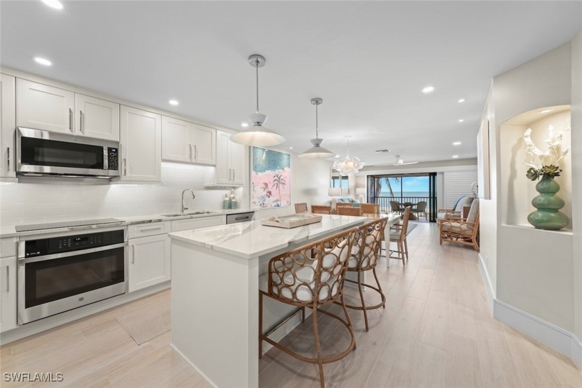 This stunning top-floor direct Gulf-front, three-bedroom - Beach Condo for sale in Sanibel, Florida on Beachhouse.com