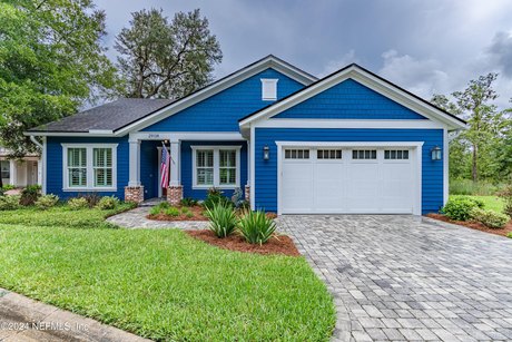 This custom home in an exclusive gated community near Fernandina - Beach Home for sale in Yulee, Florida on Beachhouse.com