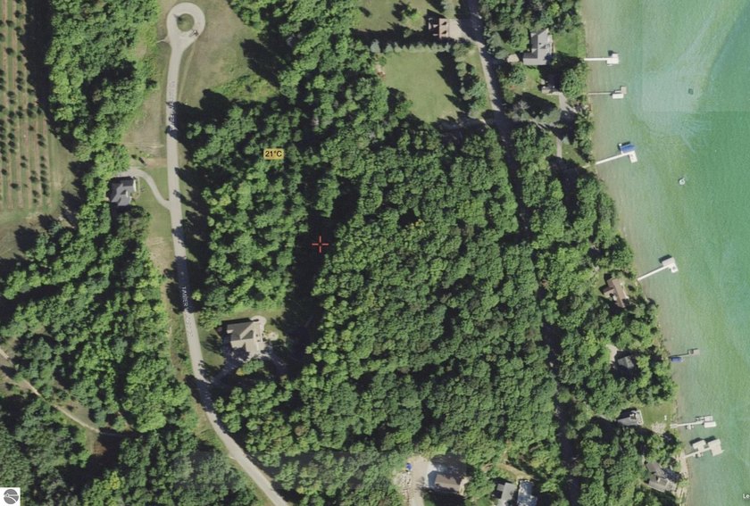 Discover an exceptional opportunity in this upscale development - Beach Lot for sale in Kewadin, Michigan on Beachhouse.com